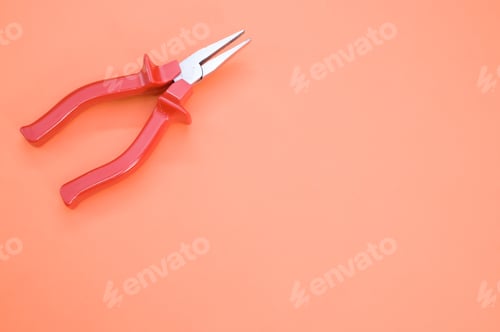 Preview: Closeup shot of long nose pliers on a colorful background