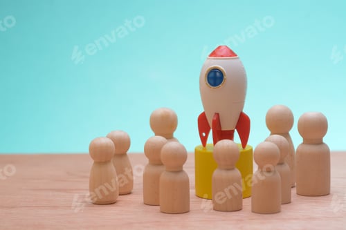 Preview: The wooden figures, clustered around a symbolic rocket, epitomized the success strategy