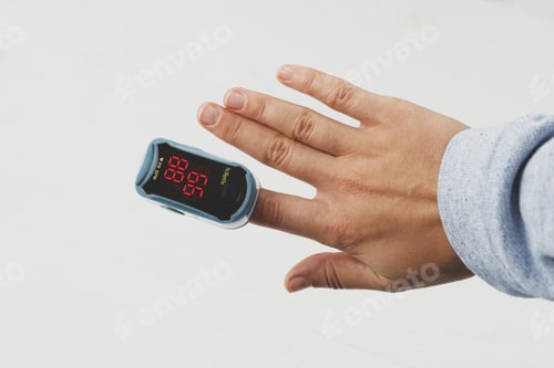 Preview: Pulse Oximeter on finger, measuring blood oxygen level, detecting coronavirus pneumonia