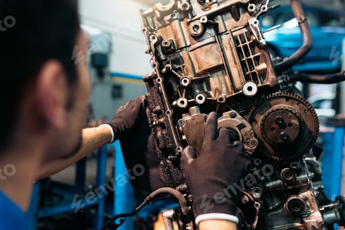 Preview: Professional Mechanic Repairing Car.
