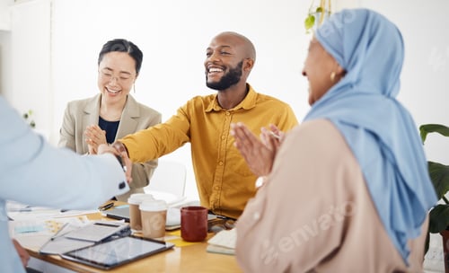 Preview: Creative people, handshake and meeting in applause for promotion, partnership or teamwork at office