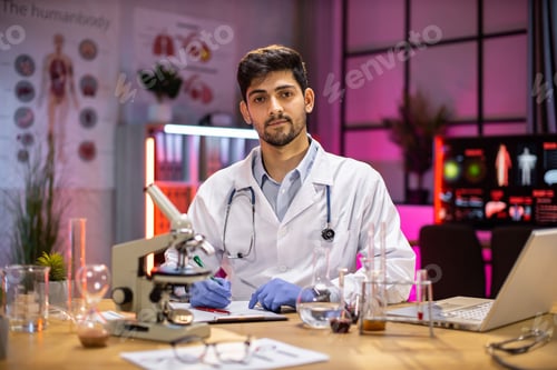 Preview: Male scientist working in laboratory.