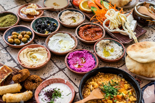 Preview: Delicious Turkish family breakfast table with pastries, vegetables, greens, spreads, cheeses, fried