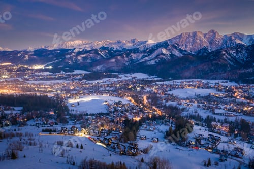Preview: Illuminated Zakopane city in winter at night, view from above