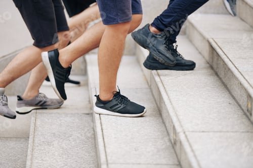 Preview: Sportsmen running up the stairs