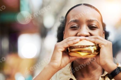 Preview: Portrait, fast food and black woman eating a burger in an restaurant or outdoor cafe as a lunch mea