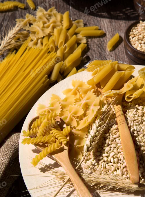 Preview: Various Types of Pasta on a Wooden Background