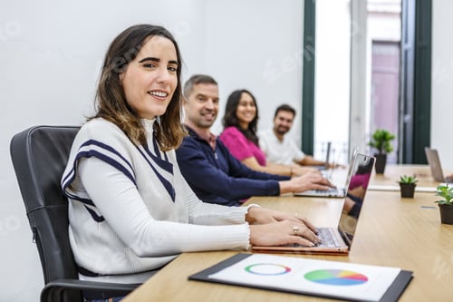 Preview: Coworking space with professionals working collaboratively at desks