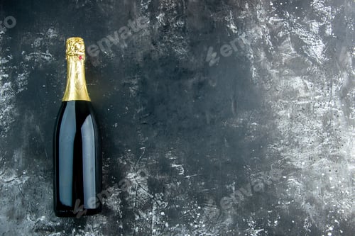 Preview: top view champagne on dark table with copy space