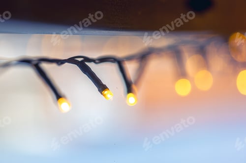 Preview: LED lights garland, light bulbs on a bokeh background.