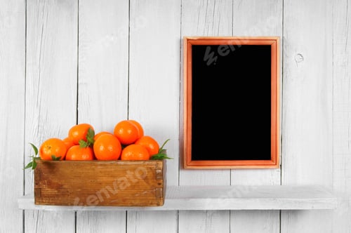 Preview: Fresh Oranges in Wooden Crate with Blank Frame