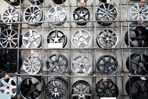 Preview: Alloy wheels on racks in automobile service center
