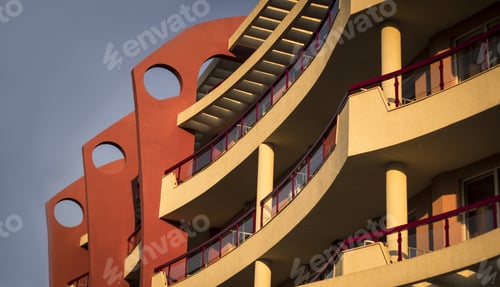 Preview: Low angle shot of a building with balconies during daytime