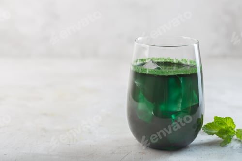 Preview: Green drink prepared with single celled green algae chlorella