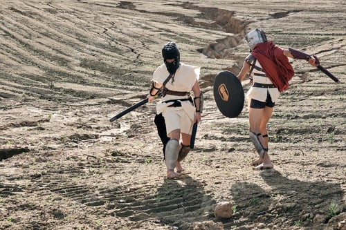 Vista previa: A Concept Photo Of A Roman Battle Of Two Warriors Of The Colosseum In Action With Aggressive