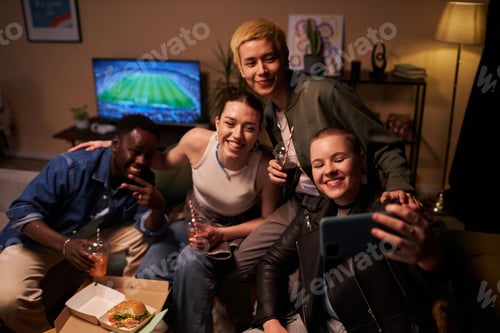 Preview: Students at Home Party with Fast Food Taking Selfie