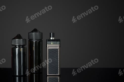Preview: Vape and smoking liquid against black background