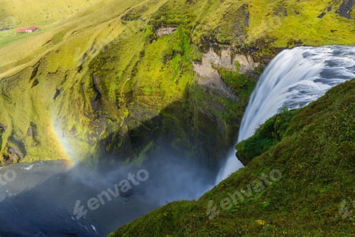 Preview: Skogafoss waterfall with rainbow in Iceland