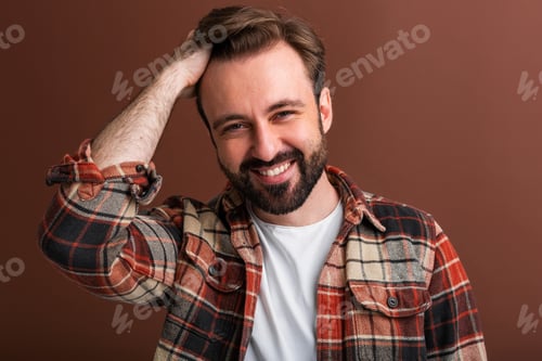 Preview: handsome man on brown background