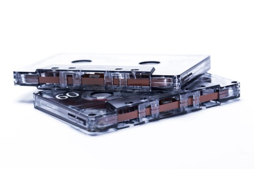 Preview: Old-fashion magnetic audio tape over white bacground