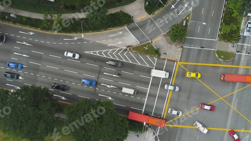 Preview: Top view of a city intersection with a bus, cars and people crossing the street. Shot. Traffic at