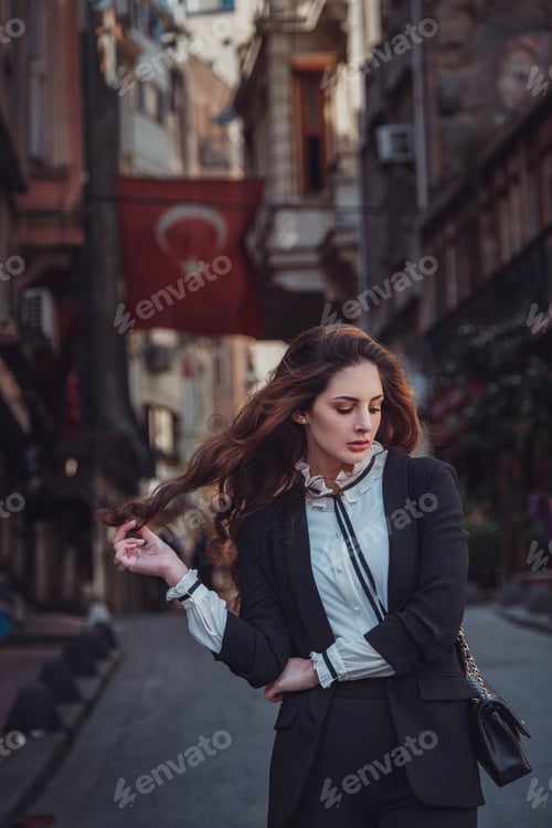 Preview: Beautiful woman walks at Istiklal street, Istambul