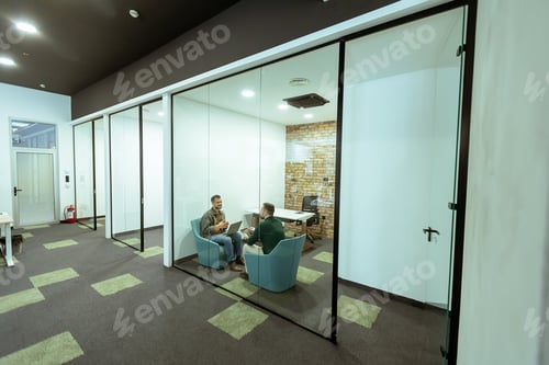 Preview: Casual Business Meeting in a Modern Office Lounge