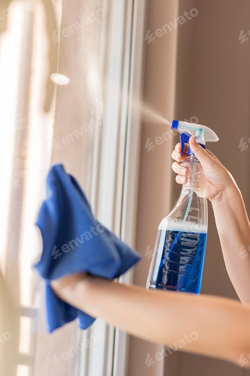 Preview: Woman cleaning windows