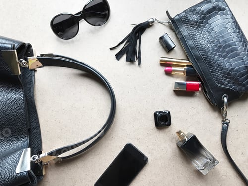 Preview: Flat Laid Make Up Cosmetic Products And Fashionable Accessories on Light Monochrome Background