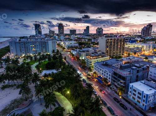 Preview: Aerial view of illuminated Ocean Drive and South beach, Miami, Florida, USA