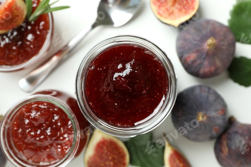Preview: Concept of tasty food with fig jam on white background