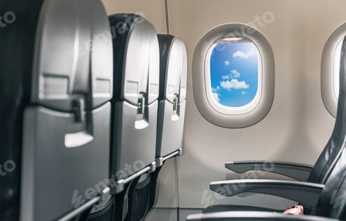 Preview: Empty seat inside airplane and window view on day fright