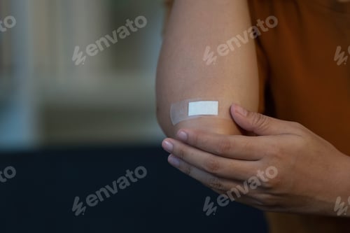 Preview: Health Awareness: Individual with Bandage on Elbow Injury