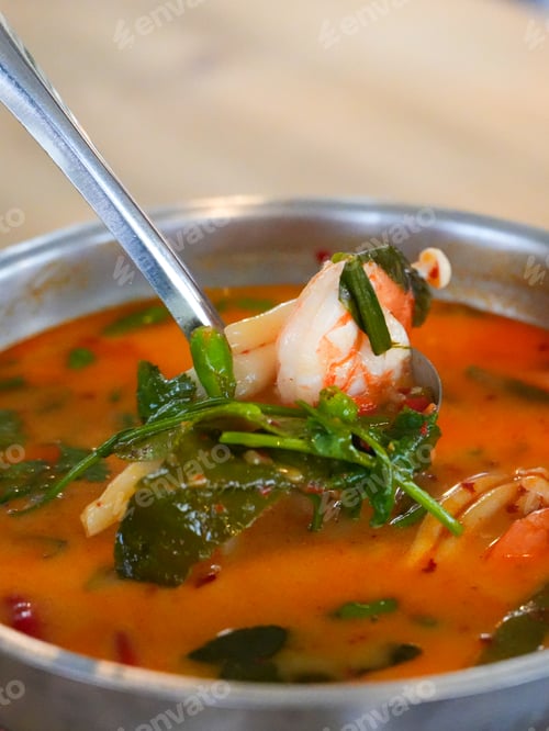 Preview: Cuisine Thailand style on top view. Traditional Tom Yum spicy Thai soup with shrimp