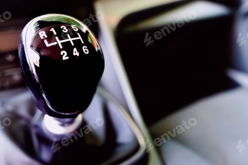Preview: Knob on the gear shift lever of a European car.