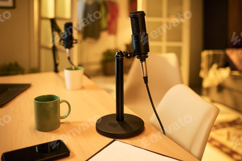 Preview: Empty Podcast Studio Awaiting Teenager Recording Podcast Episode at Home