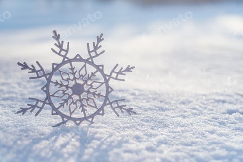 Preview: Big artificial snowflake on natural snow