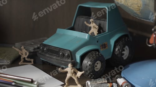Preview: Toy Soldiers and Tanks. Miniature toy soldiers on board
