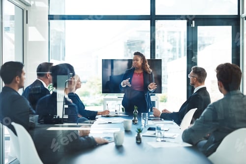 Preview: Cropped shot of an attractive young businesswoman giving a presentation in the boardroom