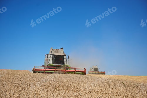 Preview: A modern combine harvester working a wheat field