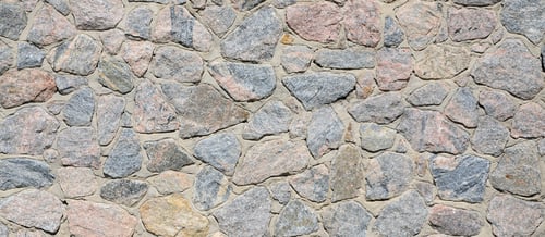 Preview: A gray stone wall, cemented between the rounded stones. Background texture