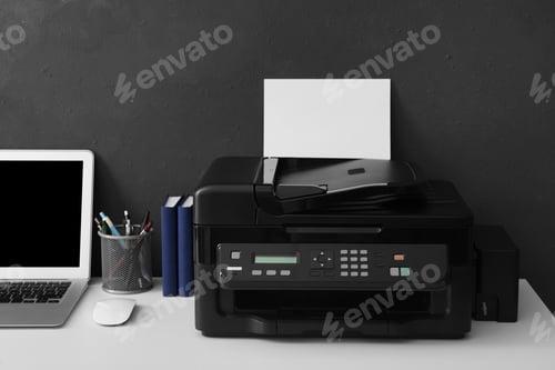 Preview: New modern printer, laptop and office supplies on white table