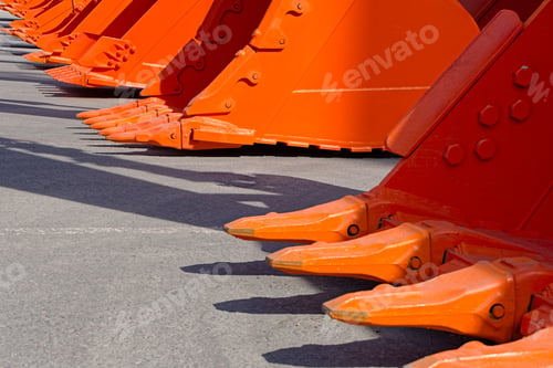 Preview: Group of orange excavator scoops