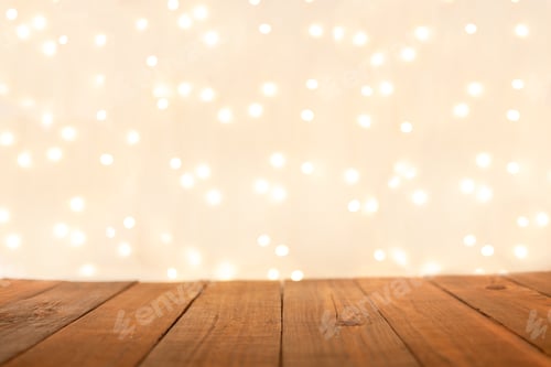 Preview: Christmas empty rustic wooden desk table over christmas blurred light bokeh