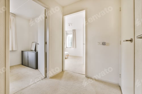 Preview: Doorway of modern apartment with white walls and parquet floor