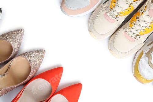 Preview: Frame of different shoes on white background, top view with space for text