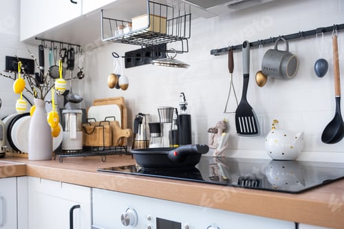 Preview: Interior of kitchen and details of decor of utensils with Easter decoration of colorful eggs