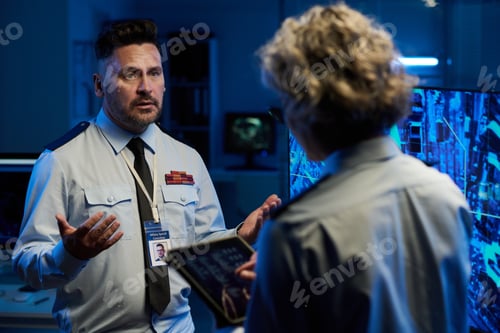 Preview: Man explaining details of graphic data