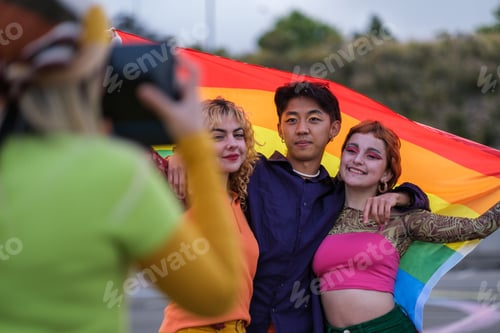 Preview: A group of friends taking a photo at the demonstration for lgtbi pride