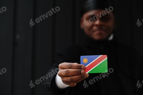 Preview: Young african man hold flag